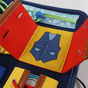 Montessori clothing training bag designed to help children practice dressing skills.